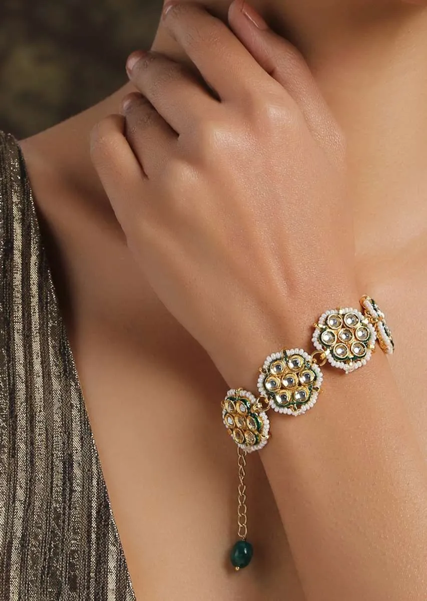 Gold And White Bracelet With Kundan And Shell Pearls Assembled In Floral Motifs By Paisley Pop