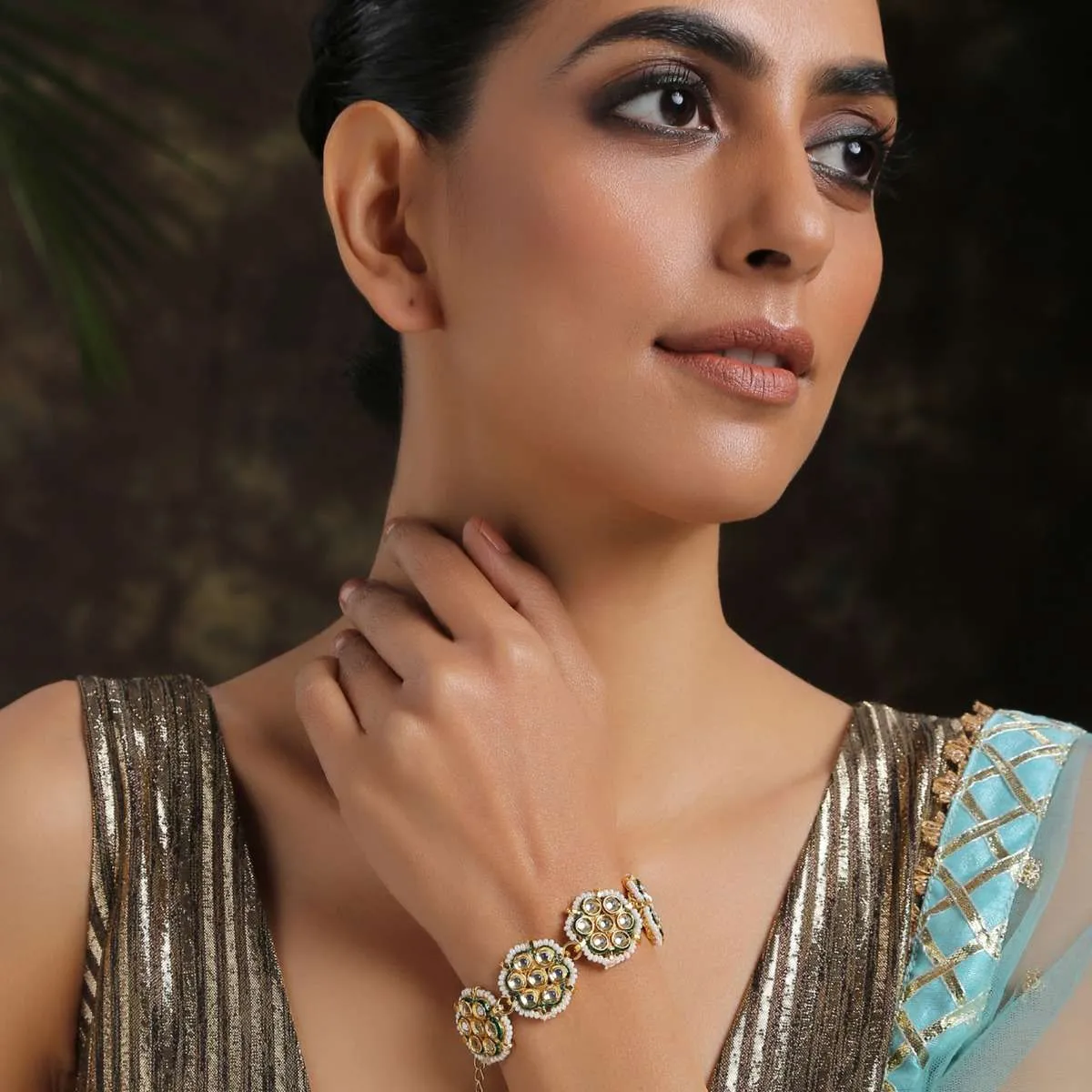 Gold And White Bracelet With Kundan And Shell Pearls Assembled In Floral Motifs By Paisley Pop